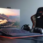 gambar berisi laptop dan kursi gaminng